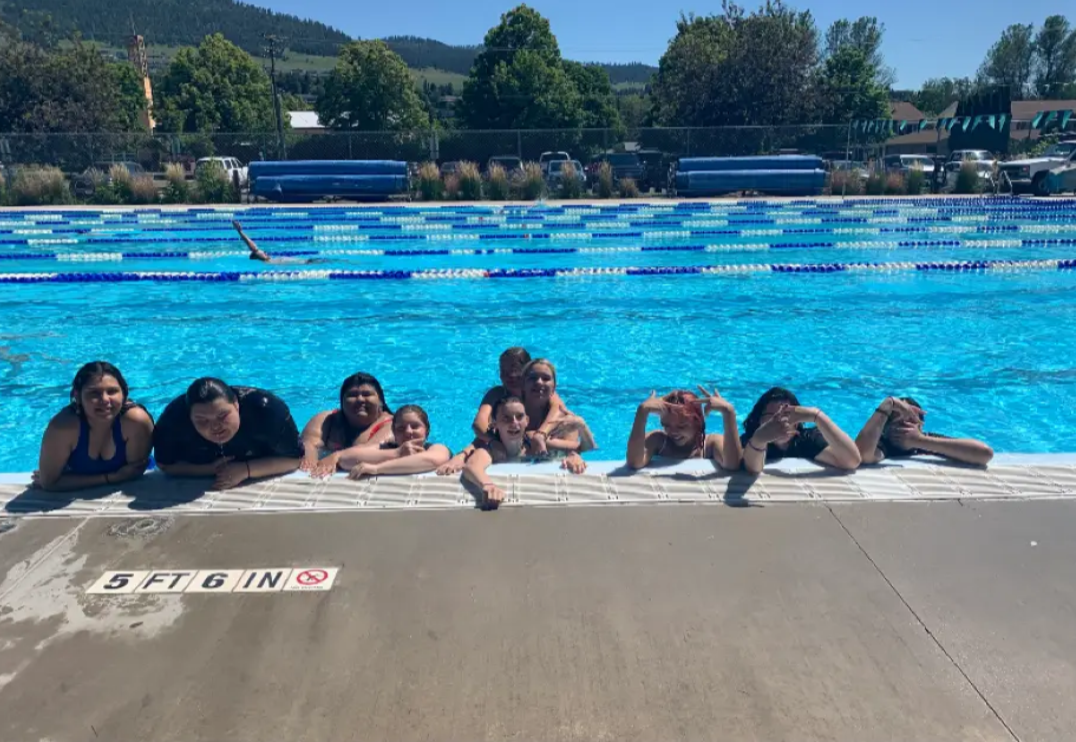 Group of Upward Bound students in the pool at Splash Montana