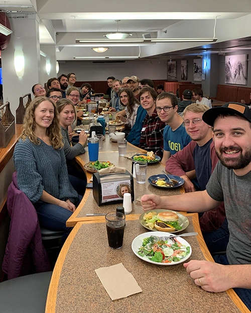 Astronomy students eat together at UM's Food Zoo.