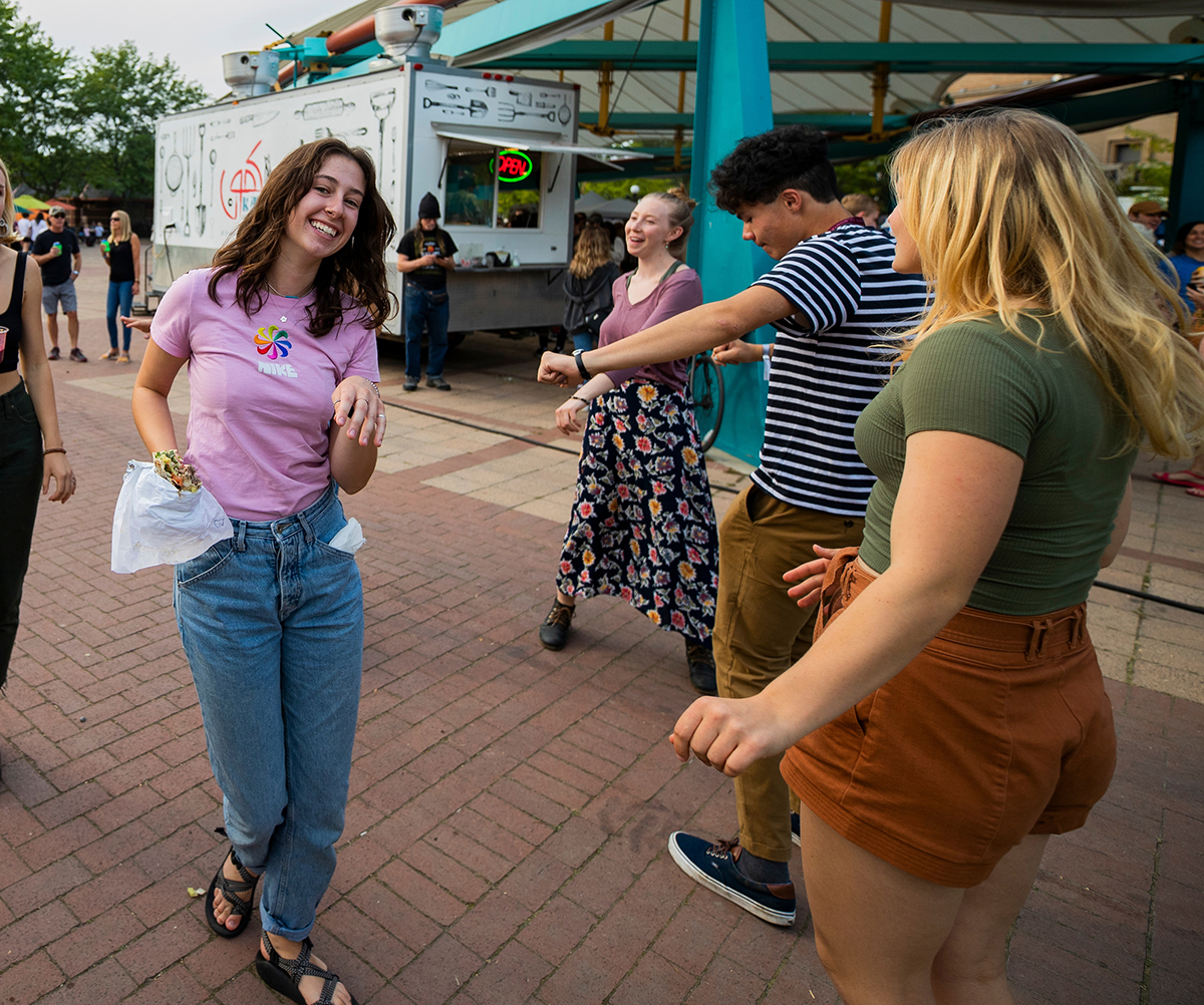 Young people dance at an event in downtown Missoula