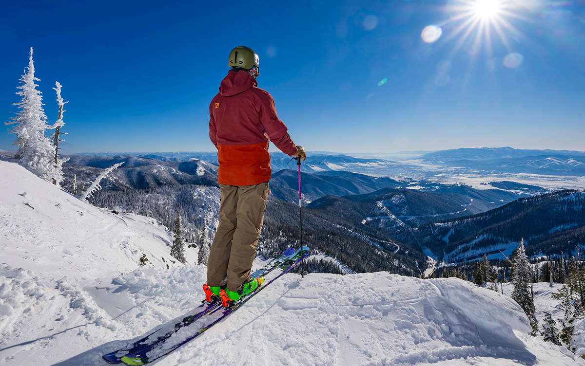 A skier looks down on the Missoula Valley from the top of West Bowl at Montana Snowbowl