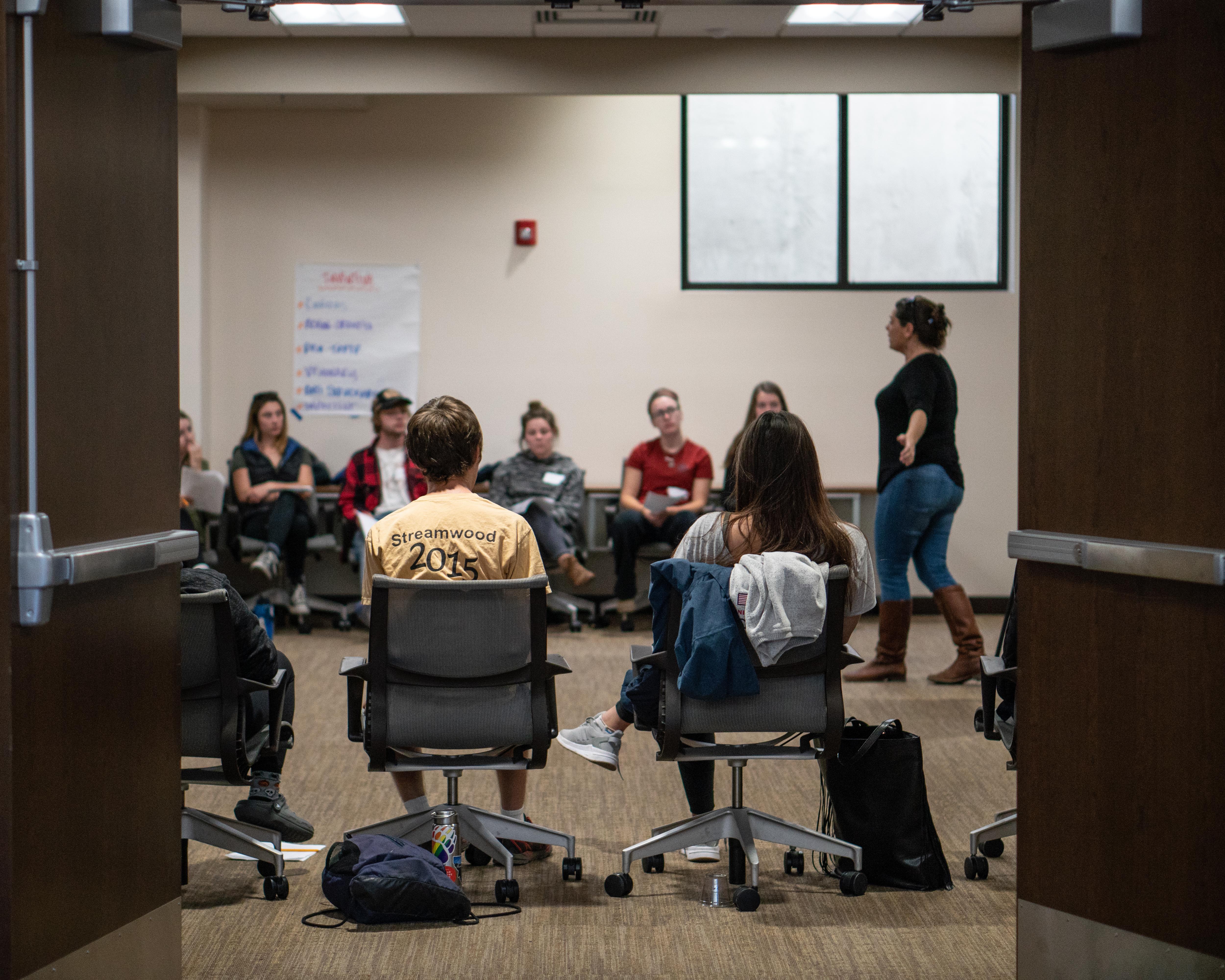 image of students sitting in a circle