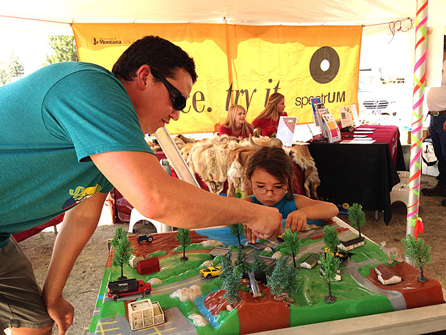 Chauncey Means, a scientist with the Confederated Salish and Kootenai Tribes, leads an environmental science activity at the Science Learning Tent.